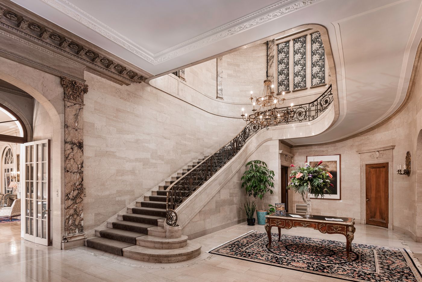 Fully restored grand staircase in a historic Buffalo mansion