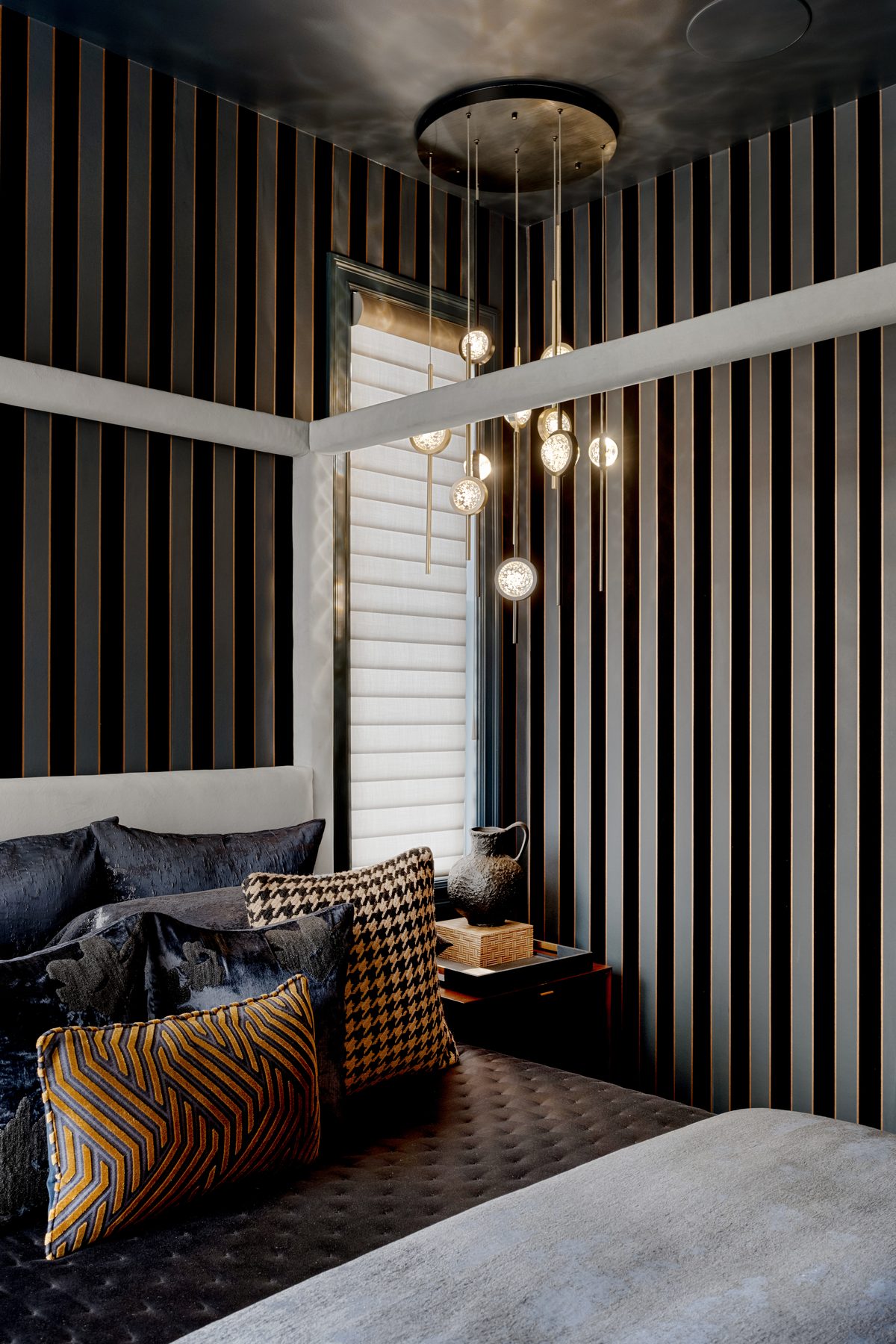 Interior photography, designer bedroom with striped walls