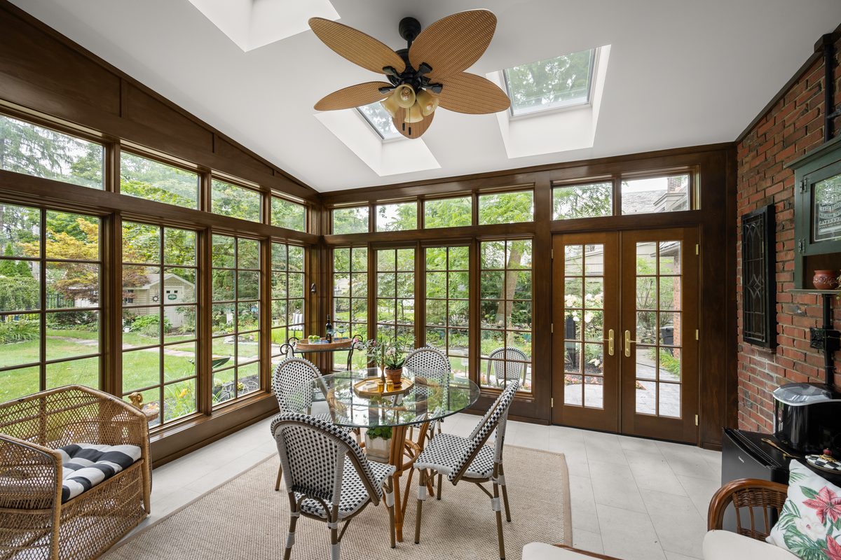 Rental photography, glass sunroom seating area