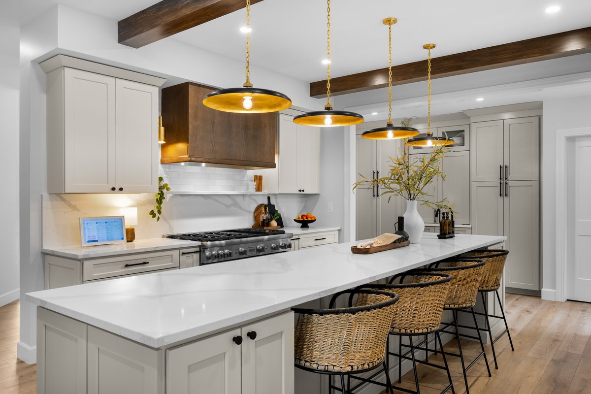 Rental photography, white and gold kitchen