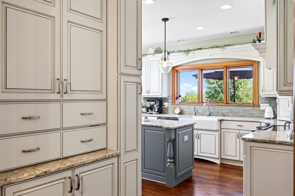 Rental photography, cream kitchen cabinetry