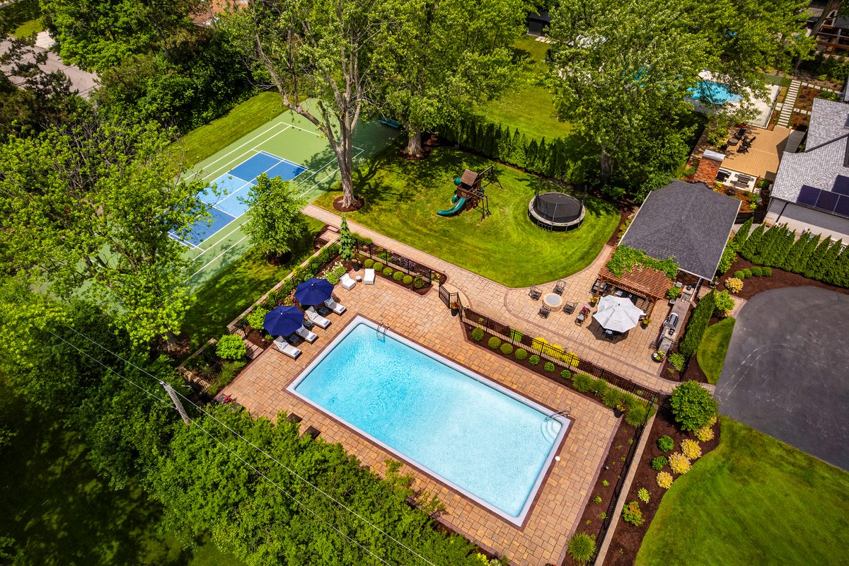 Rental photography, backyard pool and sport court from above